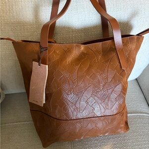 Velez genuine leather embossed tote in cognac!